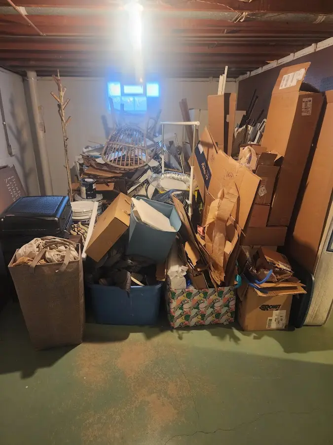 Roll-off dumpster container at job site for 8 Yard Dumpster Rental in Little Canada